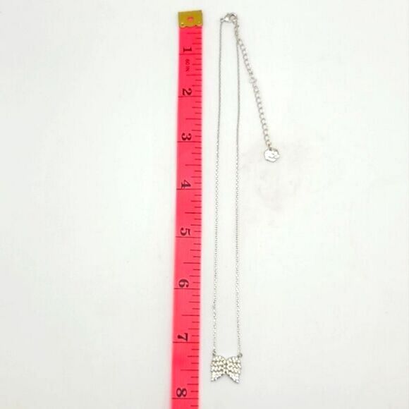 Touchstone Crystal Swarovski Angel wings necklace,  rhodium plated - Picture 3 of 5